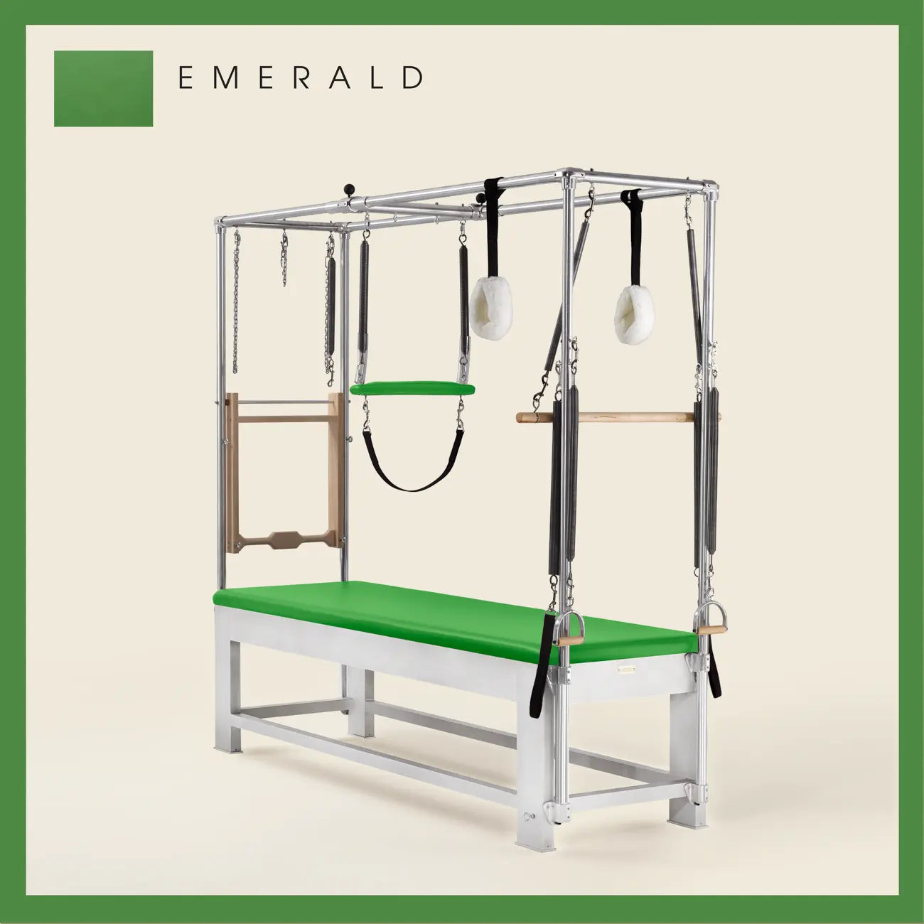 Emerald color Trapeze Table with aluminum frame, adjustable bars, straps, and springs. Premium Pilates equipment against a beige background.