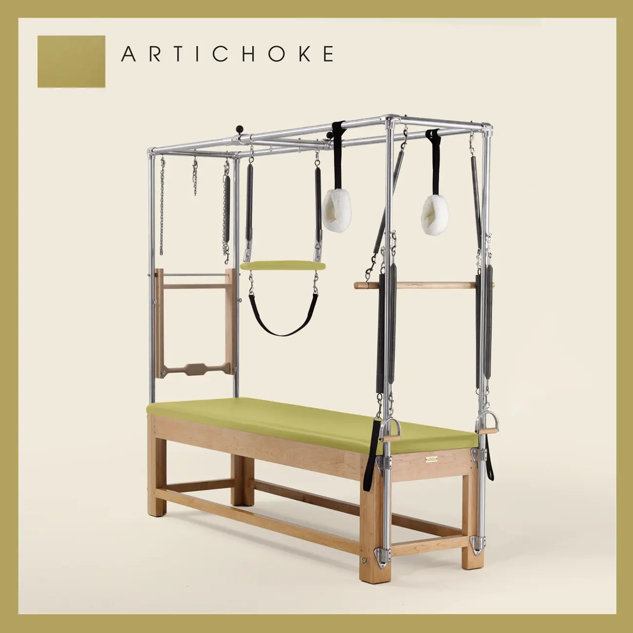 Artichoke color Pilates Cadillac with maple wood frame, adjustable bars, straps, and springs. Premium Pilates equipment against a beige background.