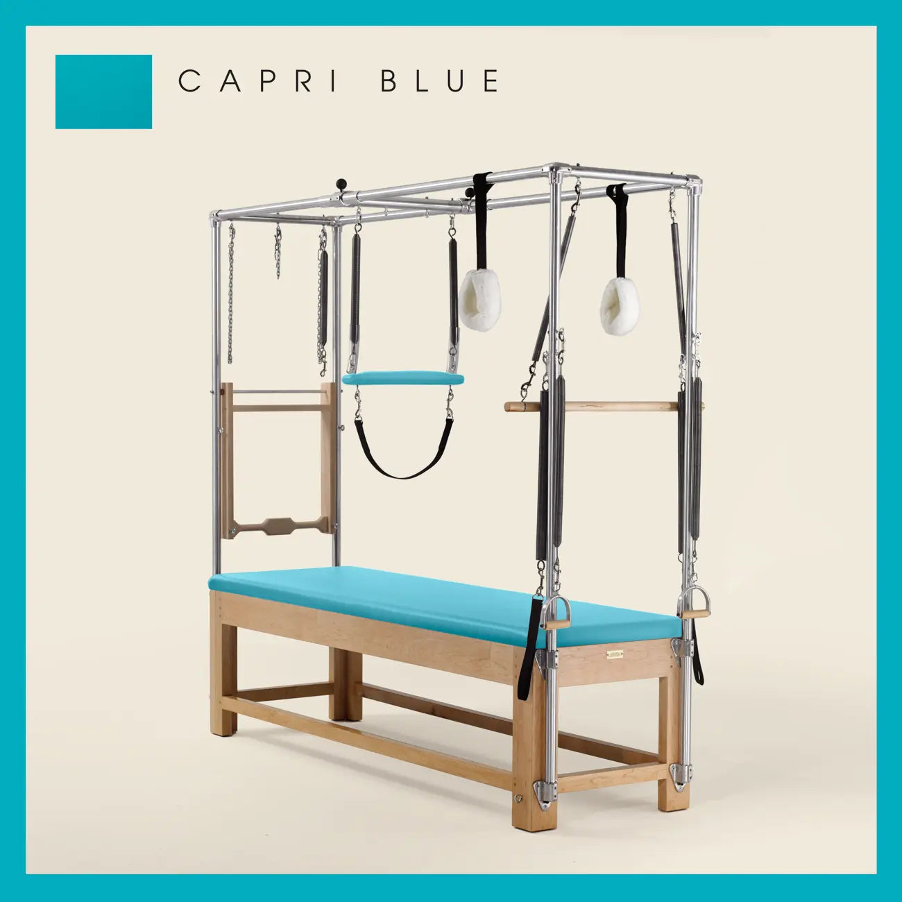 Capri Blue Pilates Cadillac with maple wood frame, adjustable bars, straps, and springs. Premium Pilates equipment against a beige background.