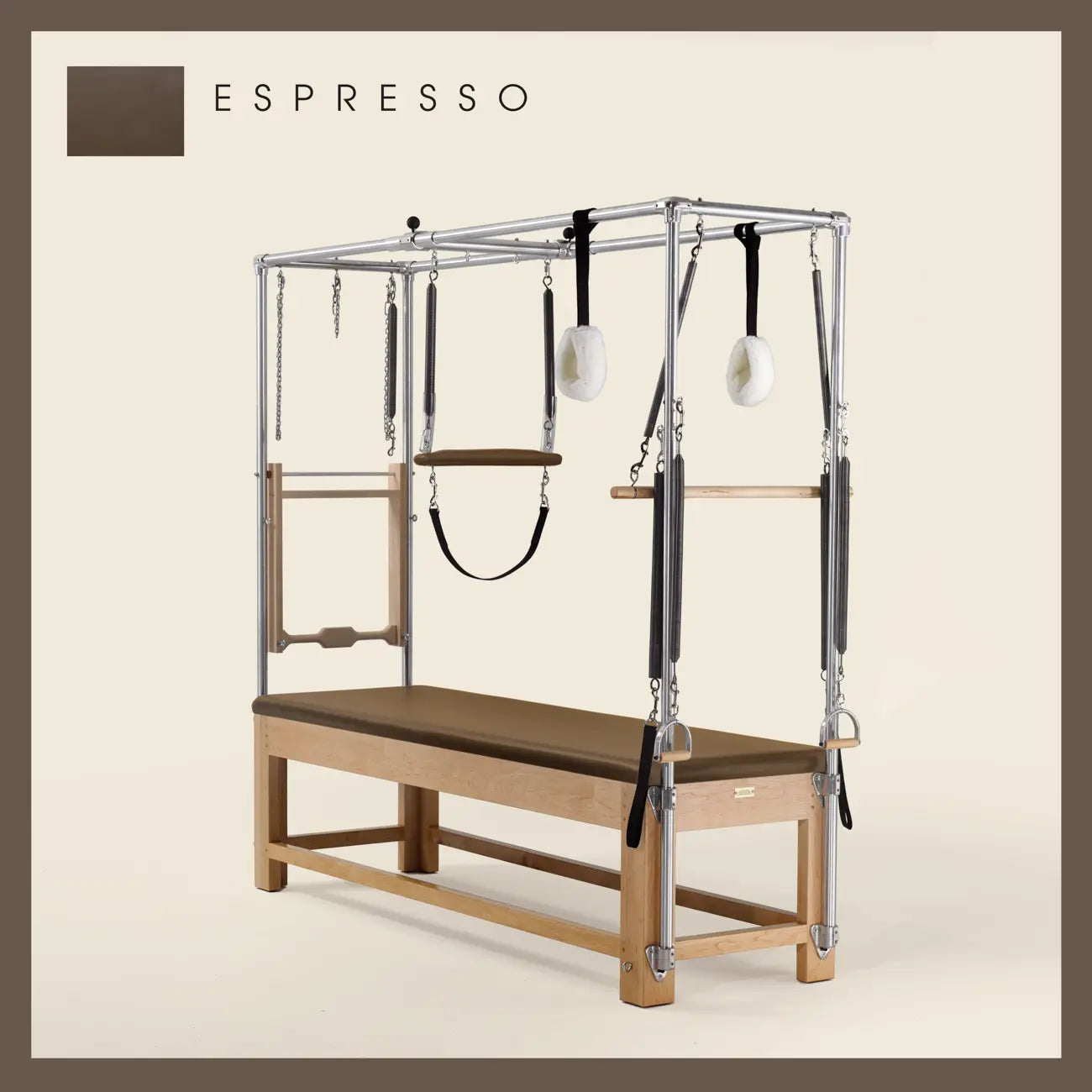 Espresso color Pilates Cadillac with maple wood frame, adjustable bars, straps, and springs. Premium Pilates equipment against a beige background.
