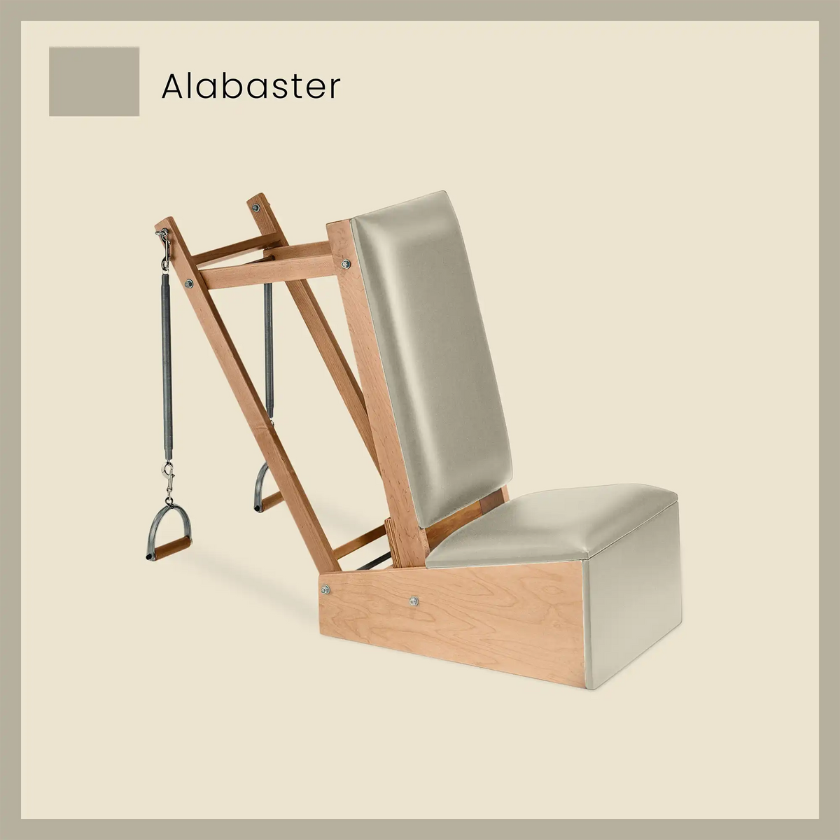 Grey Pilates arm chair featuring Alabaster-colored upholstery and natural wood base.