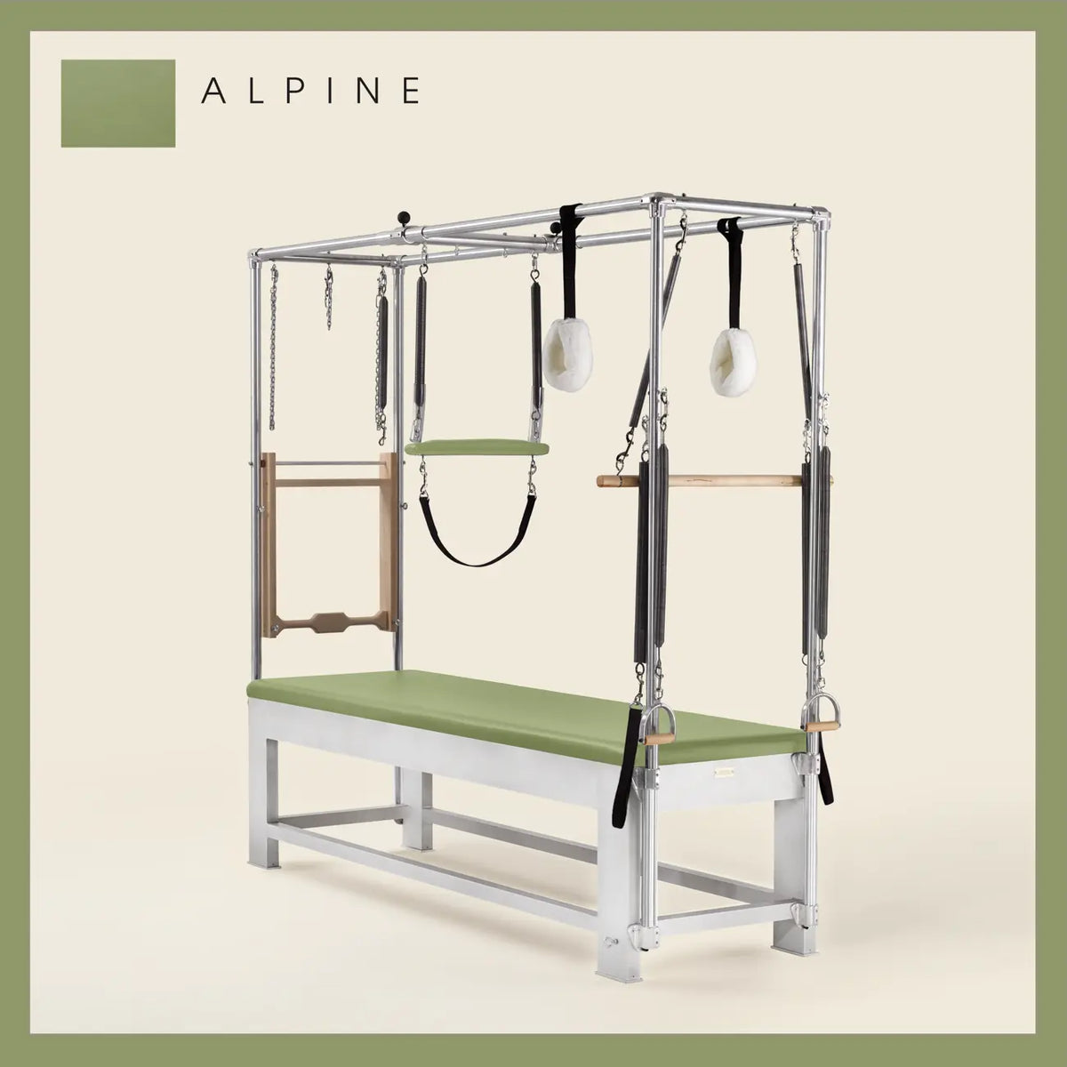 Alpine color Trapeze Table with aluminum frame, adjustable bars, straps, and springs. Premium Pilates equipment against a beige background.