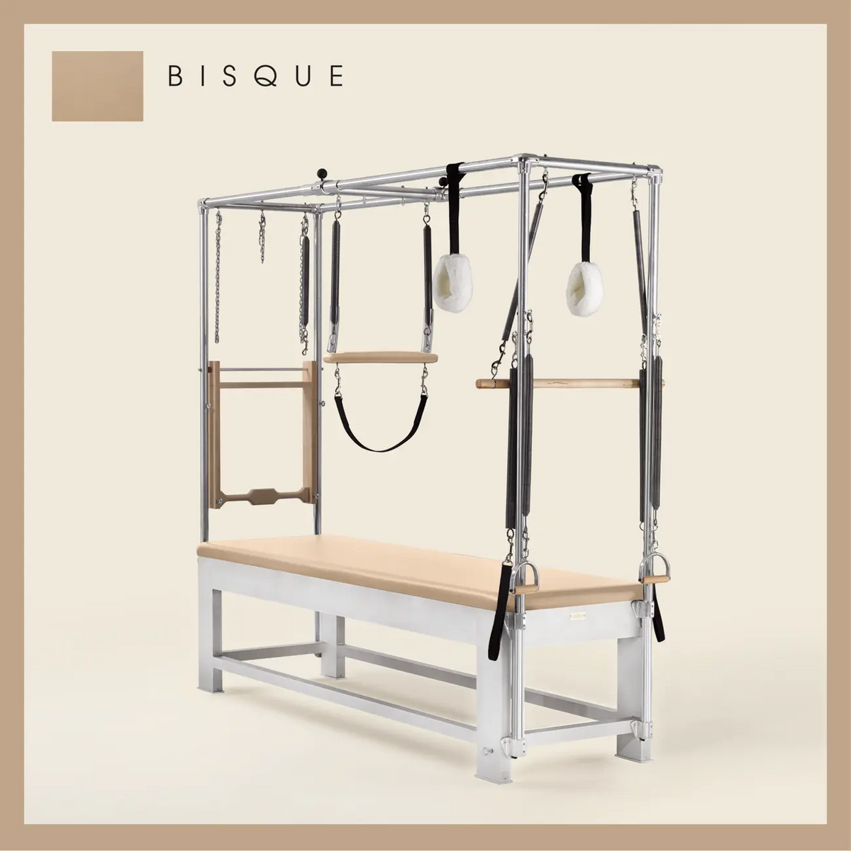 Bisque color Trapeze Table with aluminum frame, adjustable bars, straps, and springs. Premium Pilates equipment against a beige background.
