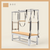 Doe color Trapeze Table with aluminum frame, adjustable bars, straps, and springs. Premium Pilates equipment against a beige background.