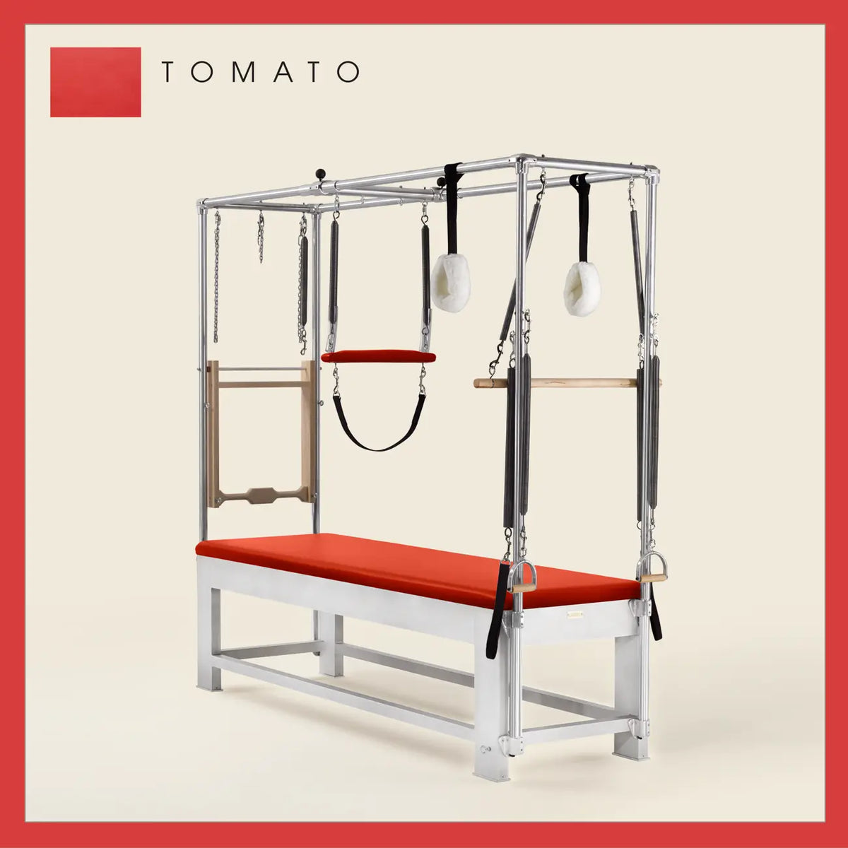 Tomato color Trapeze Table with aluminum frame, adjustable bars, straps, and springs. Premium Pilates equipment against a beige background.