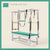 Turquoise color Trapeze Table with aluminum frame, adjustable bars, straps, and springs. Premium Pilates equipment against a beige background.