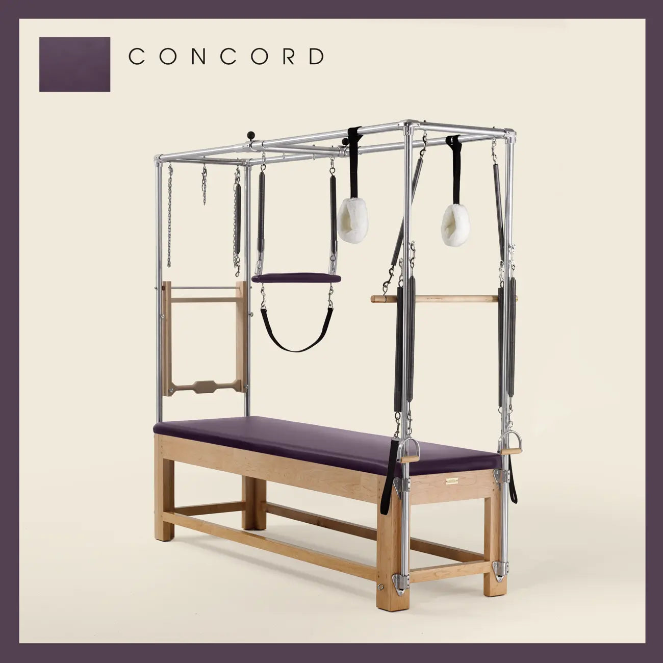 Concord Pilates Cadillac with maple wood frame, adjustable bars, straps, and springs. Premium Pilates equipment against a beige background.