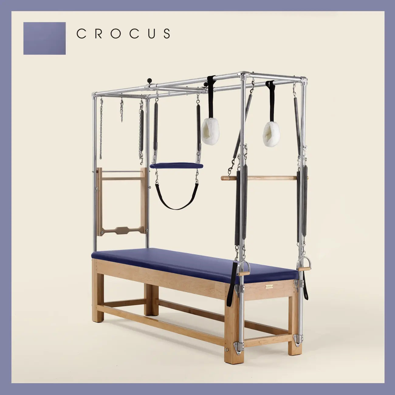 Crocus Pilates Cadillac with maple wood frame, adjustable bars, straps, and springs. Premium Pilates equipment against a beige background.