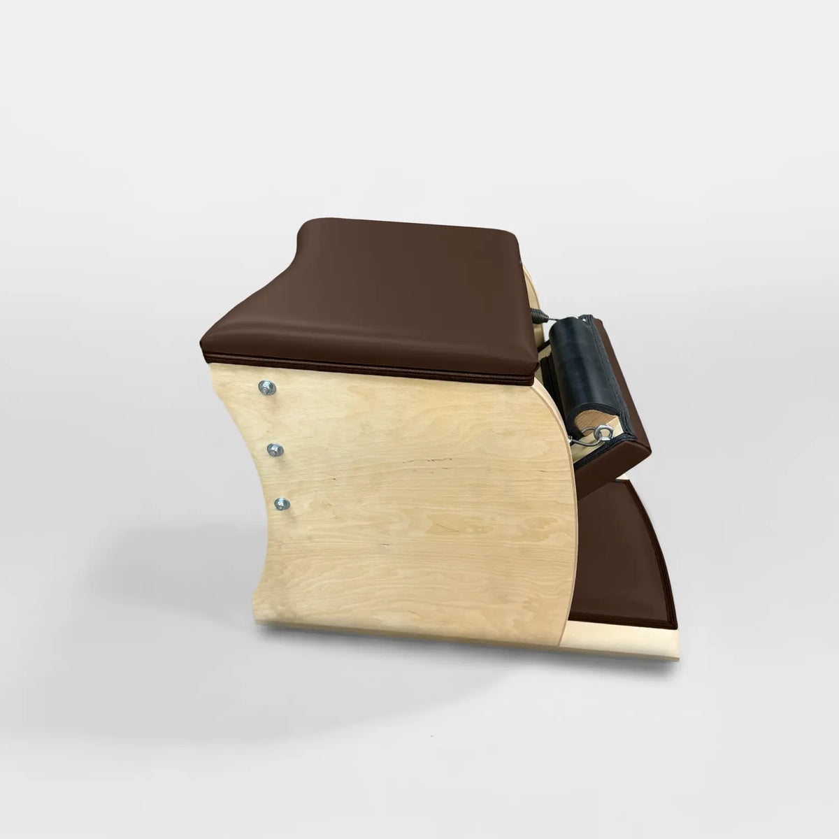 Gratz Pilates Wunda Chair in espresso brown leather with maple wood base and spring pedal.