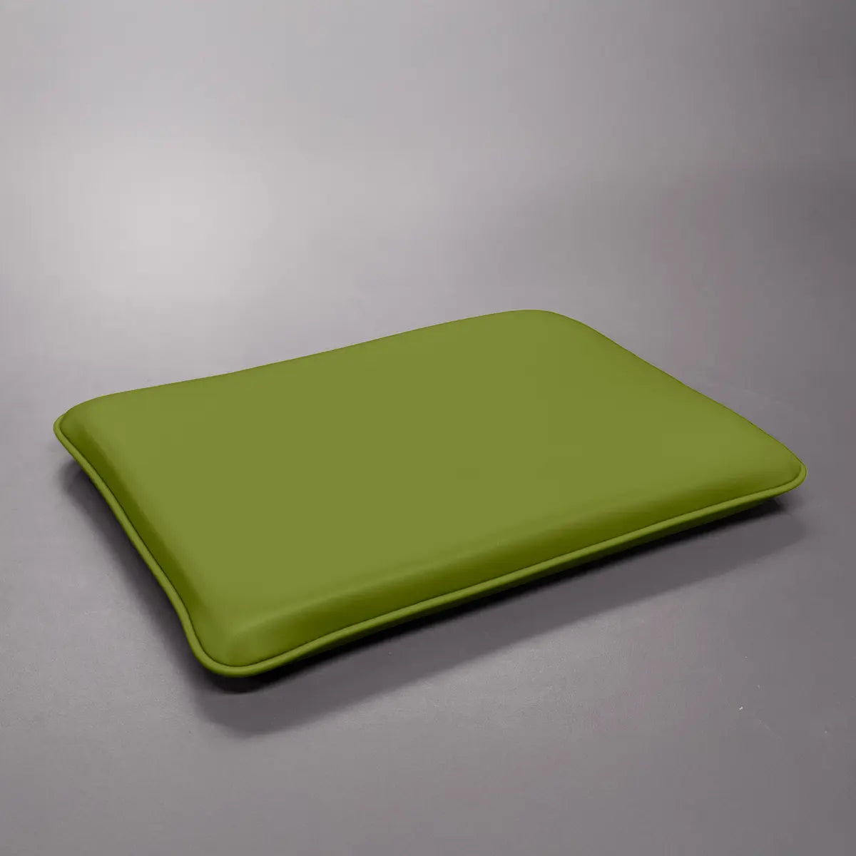Olive Green Pilates Electric Chair or Wunda Combo cushion on a gray background
