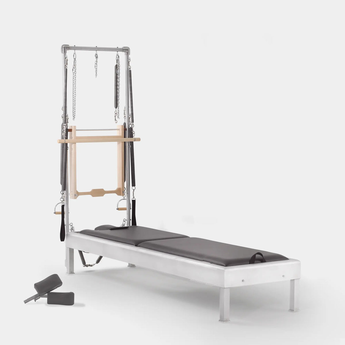 Gratz Pilates half Cadillac with aluminum frame, greystone upholstery, springs, straps, and push-through bar.