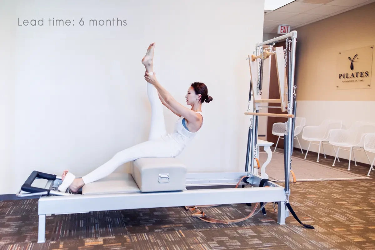 Korean Woman exercising on the Instant Half Cadillac Conversion in their studio. Text reads: "Lead time: 6 months"