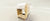 Gratz Pilates Ladder Barrel in Maple Wood in color Ivory sitting behind a creamy background