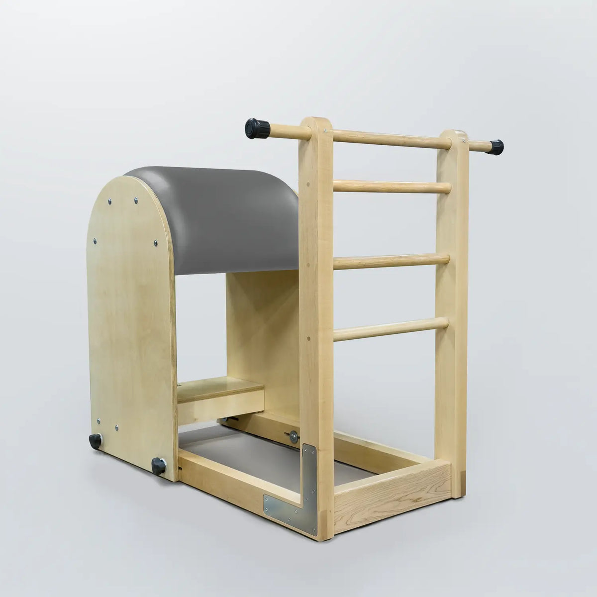 Gratz Pilates ladder barrel in greystone upholstery with wooden frame and rungs.