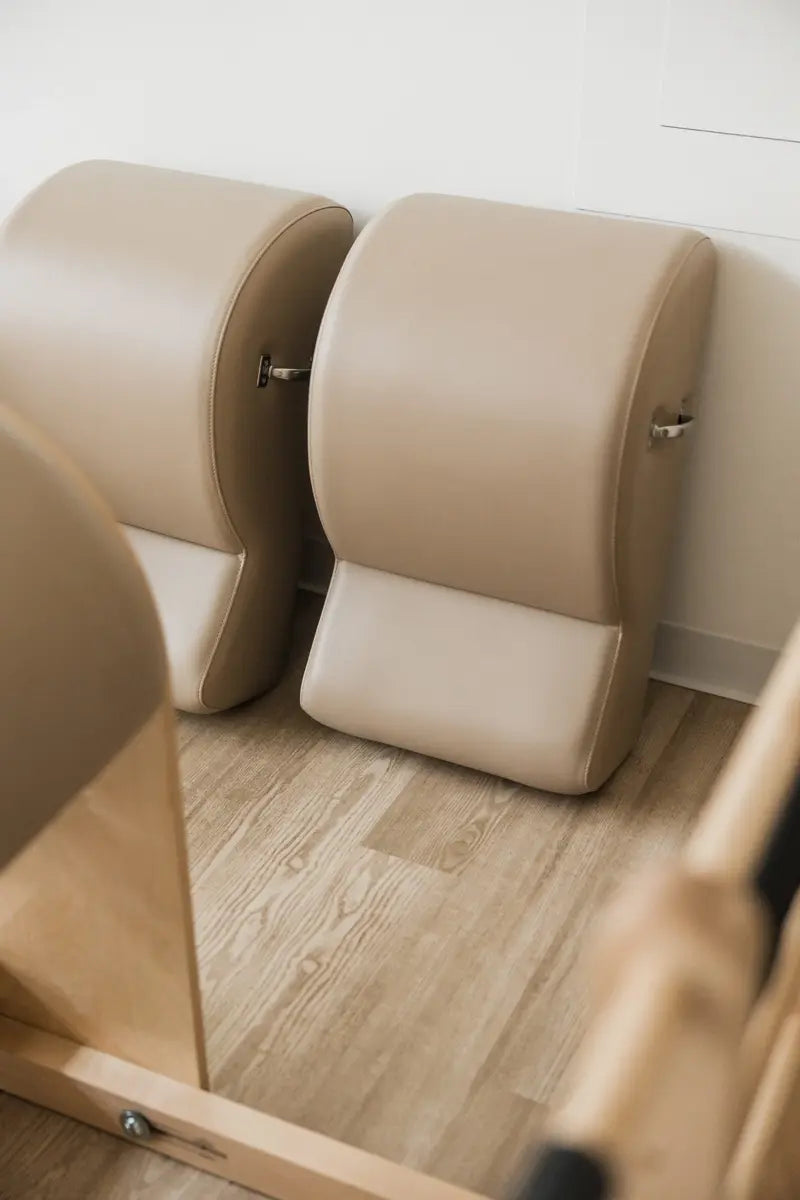 The Pilates Loft Studio with Spine Correctors and Ladder Barrel in the color Bisque