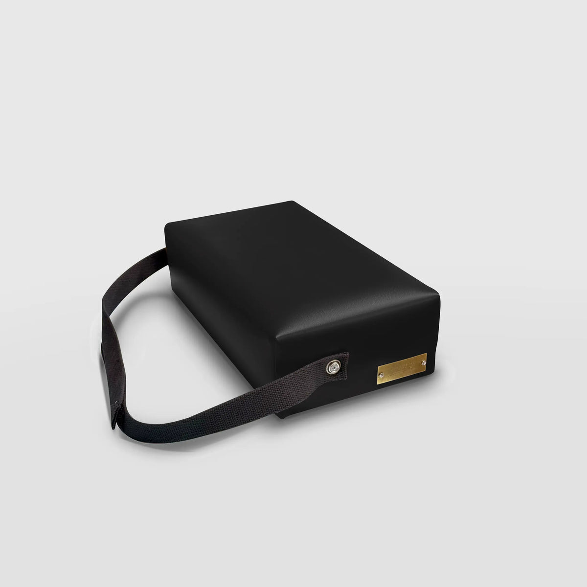 Gratz Pilates spacer box in black leather with carrying strap and brass nameplate.