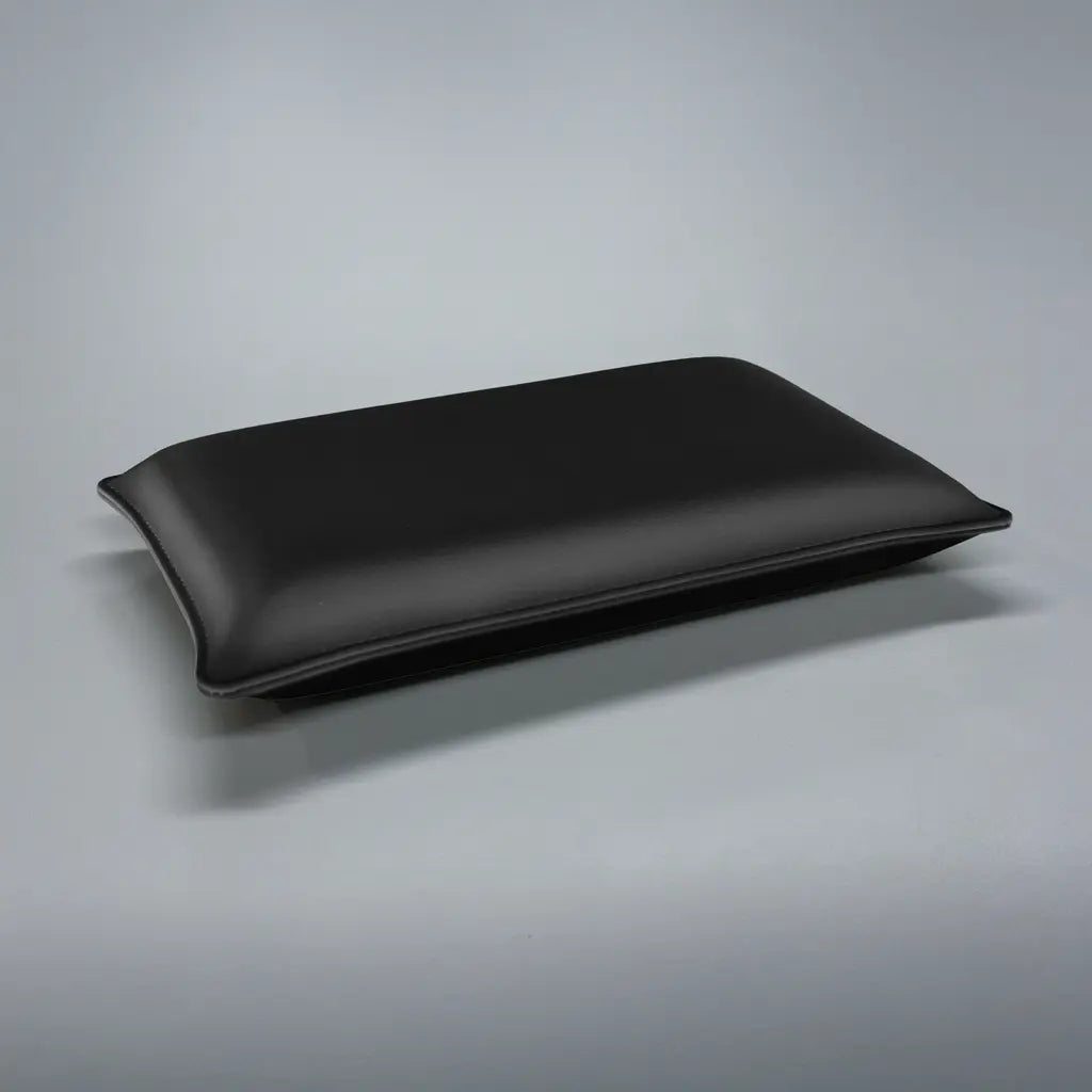 Gratz Pilates thick black leather headrest pillow for reformer or Cadillac equipment.