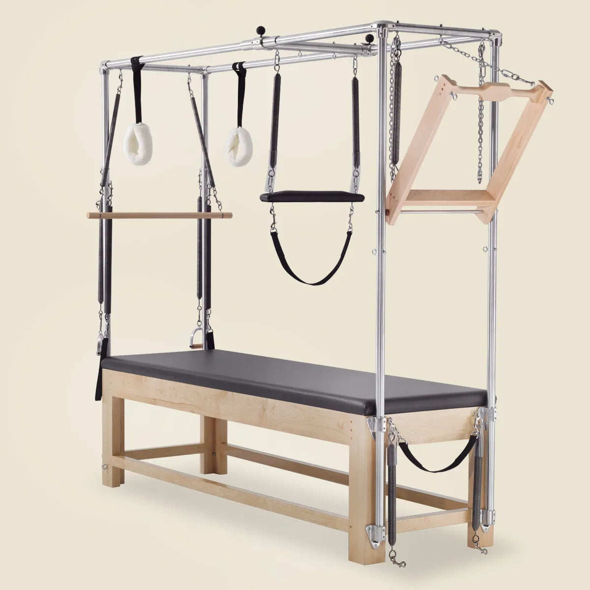 Wooden Pilates Cadillac reformer with canvas straps and sheepskin loops for enhanced grip and comfort